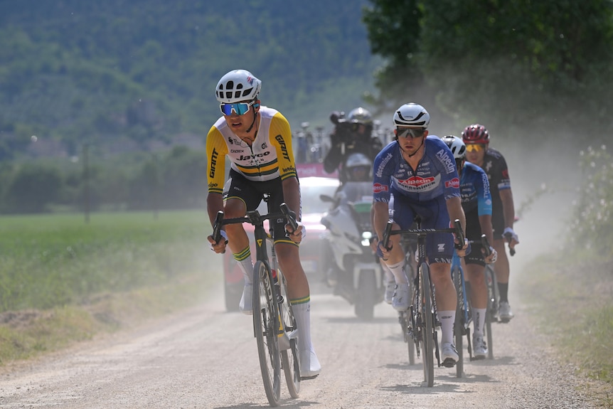 Professional riders in the Giro on a gravel road