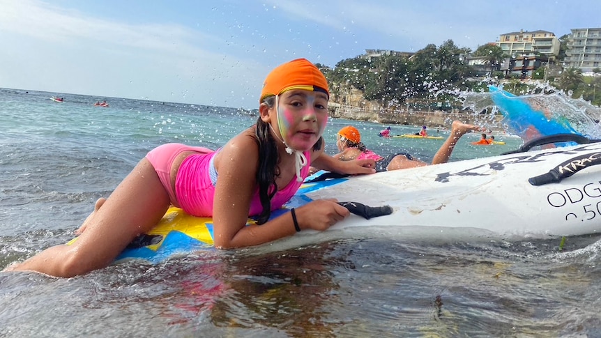 Young girl on a surfboard