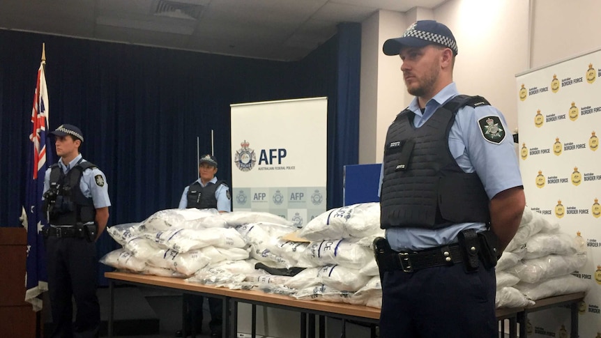 Police guarding a drug haul.