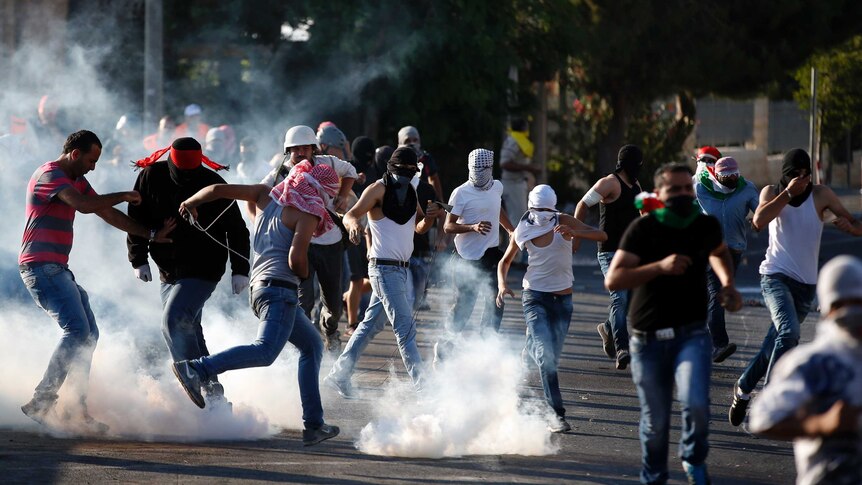 Palestinian mourners protest in Jerusalem