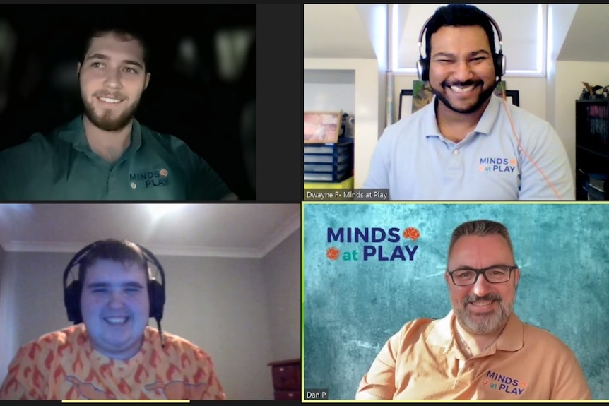 Four people on an online conference call, they are all smiling