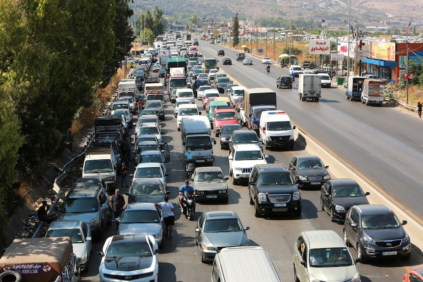 Five lanes of traffic at a standstill.