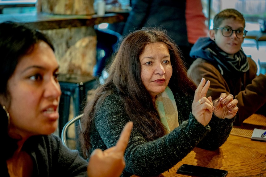 Suti Desai having a conversation during the cider tasting in the Blue Mountains