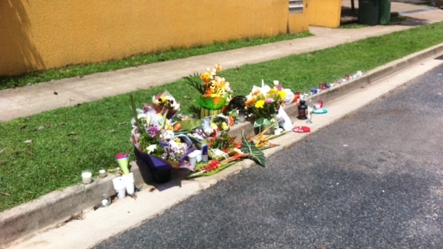 Floral tributes on the street where 23-year-old Shandee Blackburn was murdered in Mackay in north Qld