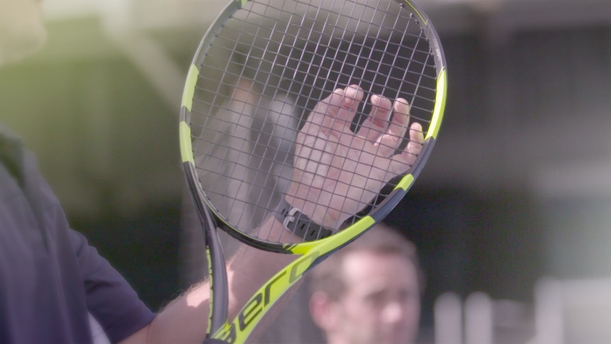 Good generic of a tennis player holding a racket.