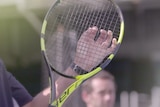 Good generic of a tennis player holding a racket