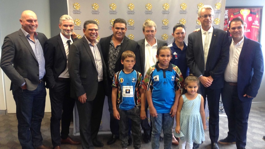 Renewed focus ... David Gallop (second from right) with football and sporting identities including Craig Foster (second from left) and Mark Ella (third from left)