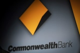 The Commonwealth Bank logo on a building in Sydney.