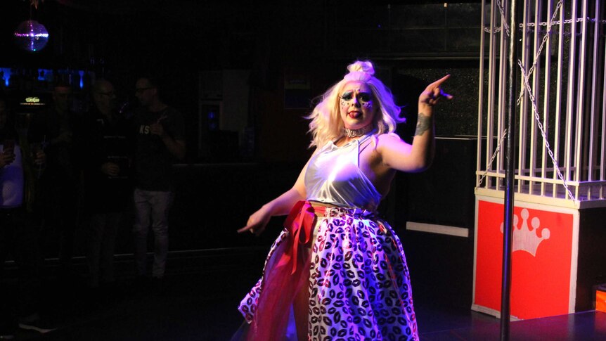 Faux queen Kat Daddi performing drag
