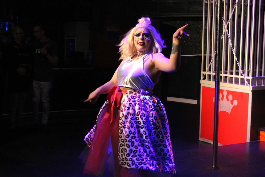 Faux queen Kat Daddi performing drag