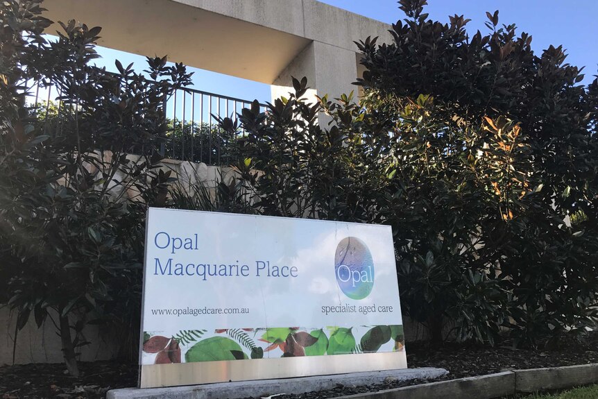 A sign outside the the Opal Macquarie Place aged care facility.