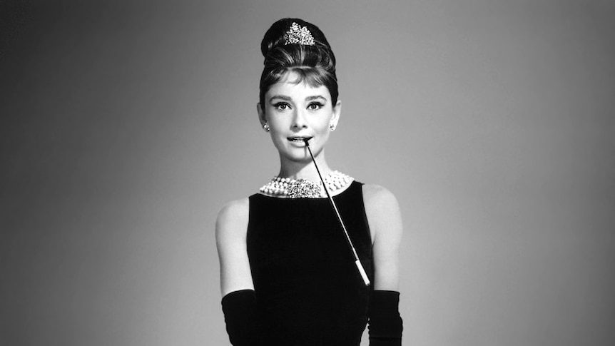 Audrey Hepburn was Hubert de Givenchy's muse and wore his iconic dress in the classic film Breakfast at Tiffany's.