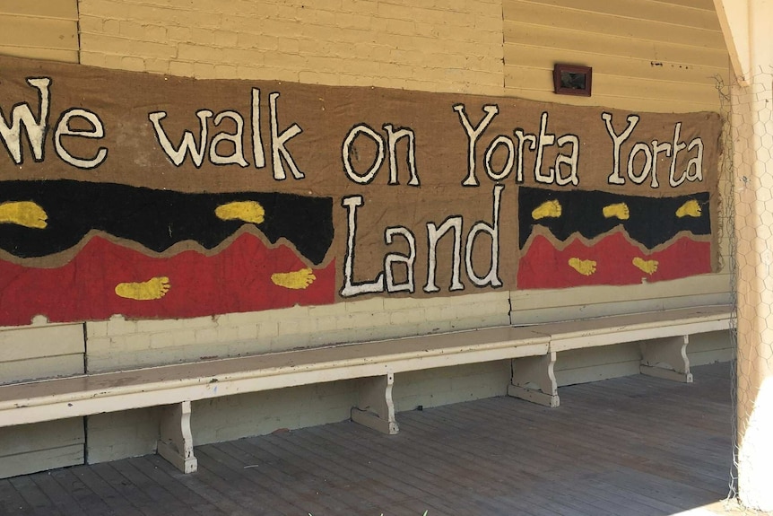 A banner reading 'We walk on Yorta Yorta Land'