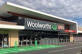 The front of the Woolworths in Spring Farm under a cloudy sky.