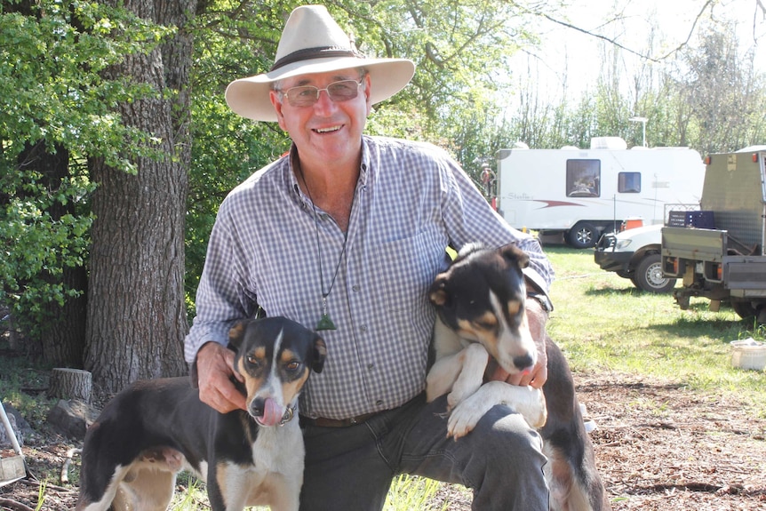 Eddie Thompson with two of his dogs, Freddie and Ned