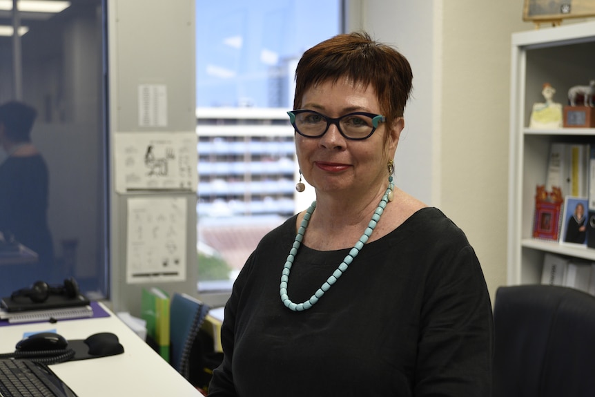 Suzan Cox QC, Director of the Northern Territory Legal Aid Commission sits in her office. 