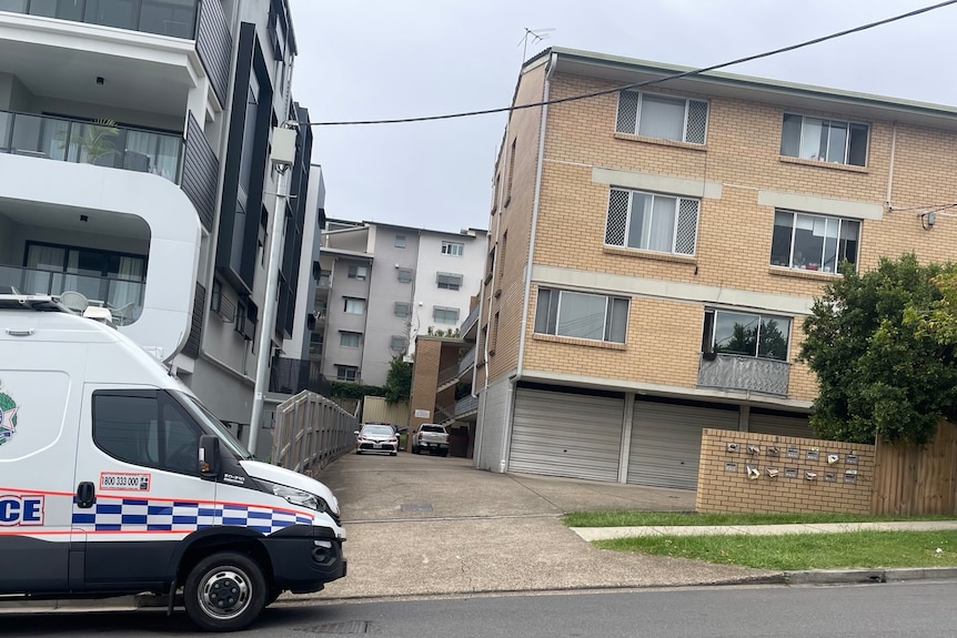 Police at the scene of apartments in Windsor where officers looking for Gold Coast woman Wendy Sleeman found a body