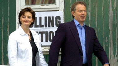 British PM Tony Blair and his wife leave their local polling station
