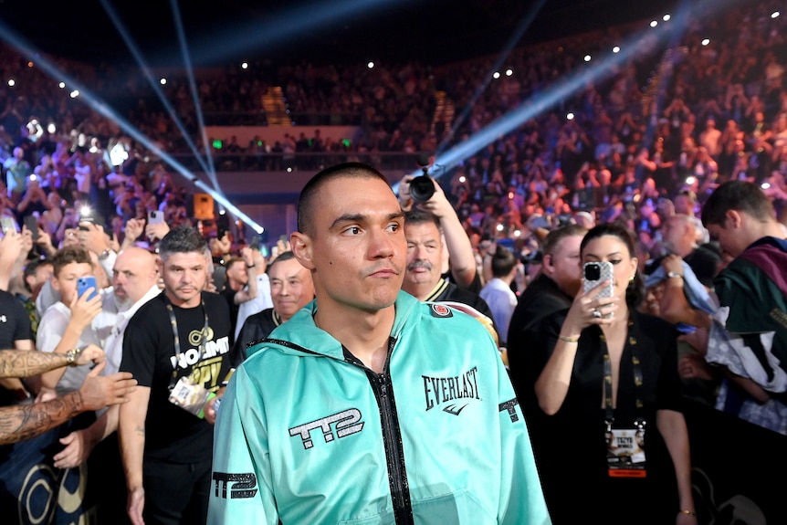 Tim Tszyu walks to the ring