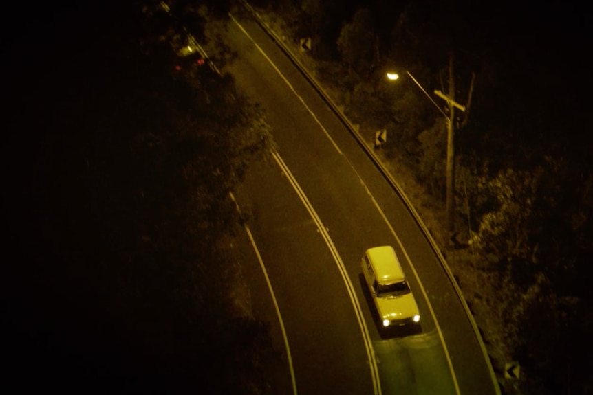 A car at night on Barrenjoey Road.