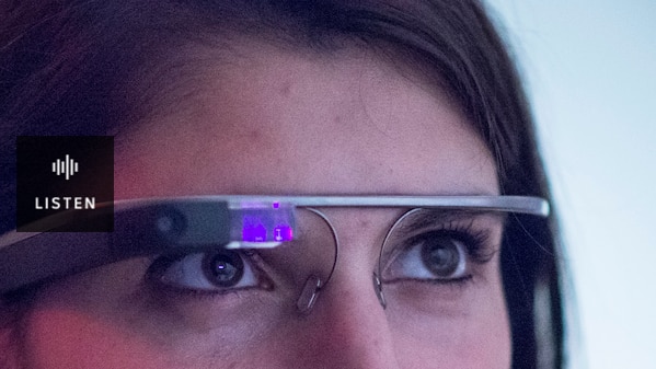 Close-up of a woman's eyes wearing a Google Glass device. Has Audio.
