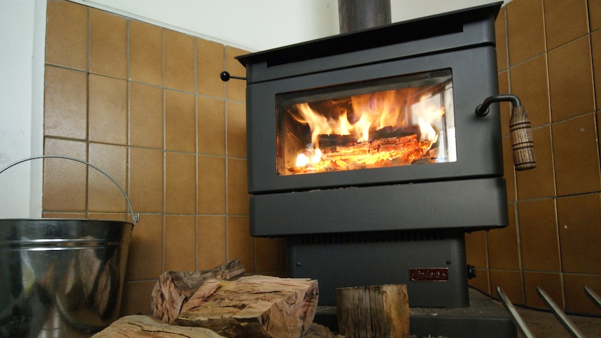 A wood heater in a house.