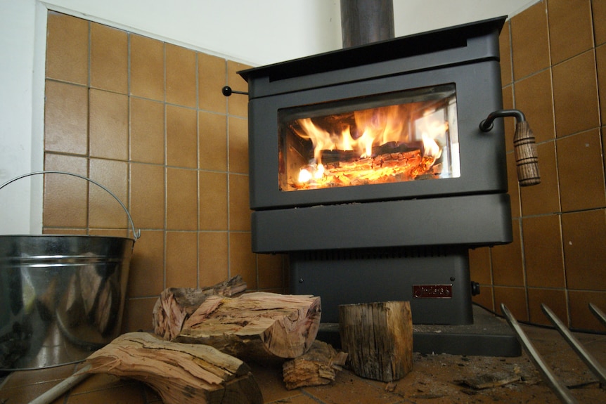 A wood heater in a house.