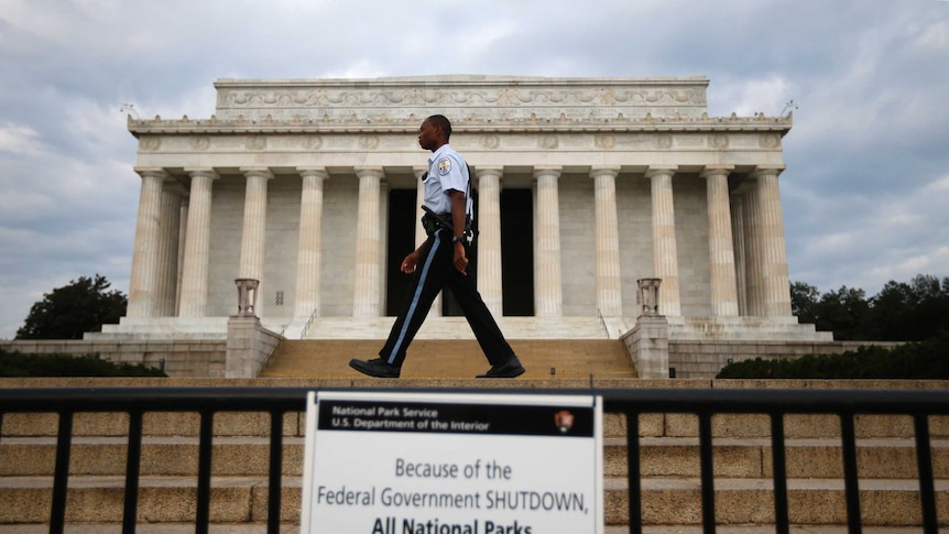 A policemen walks past a sealed-off Lincoln Memorial in Washington during the US government shutdown of October 2013.