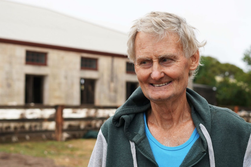 Richie Foster smiling outside the woolshed at the Blades of Glencoe Shearathon.