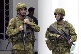 Australian soldiers stand guard in East Timor's capital Dili