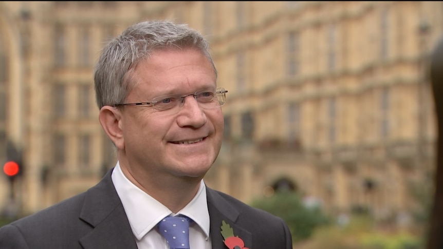 British MP Andrew Rosindell speaks to reporters in Westminister UK.