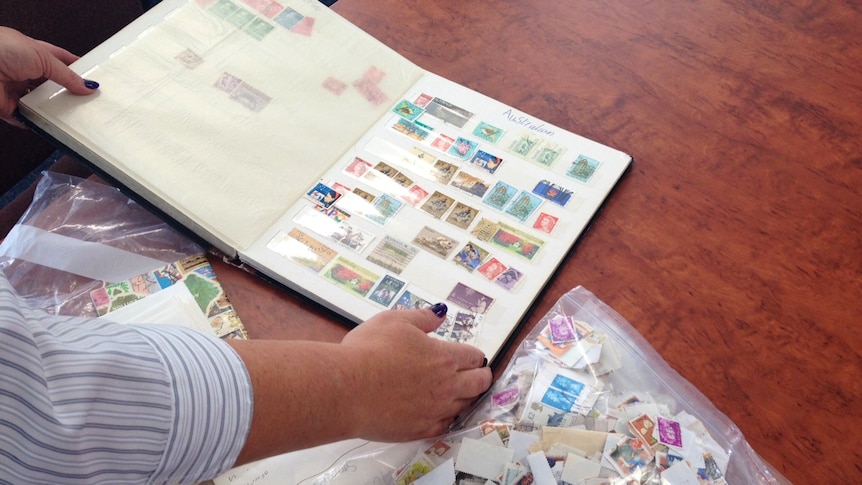 Tasmania police display a stamp collection recovered 30 years after it was stolen.