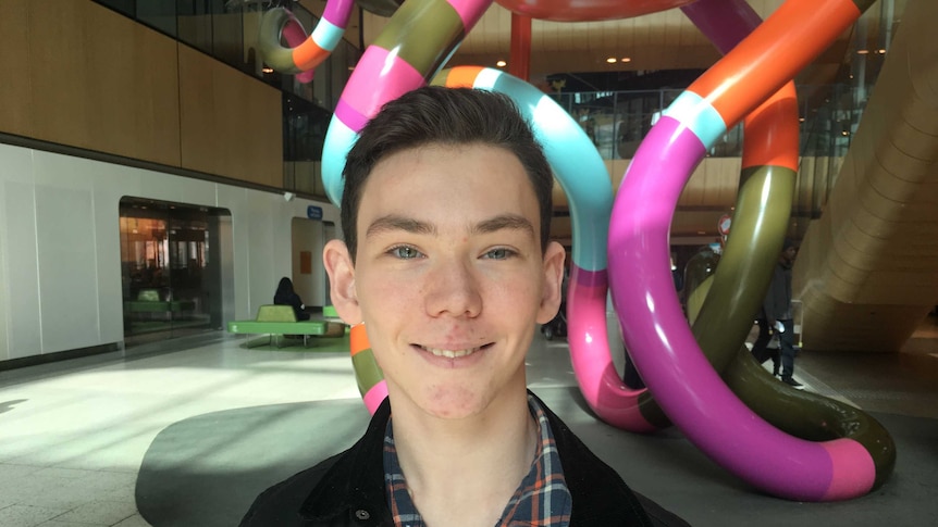 Louis Hehir in the foyer of the Royal Children's Hospital in Melbourne.