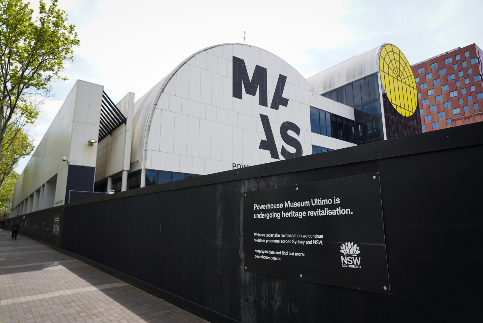 A building with a curved roof. 