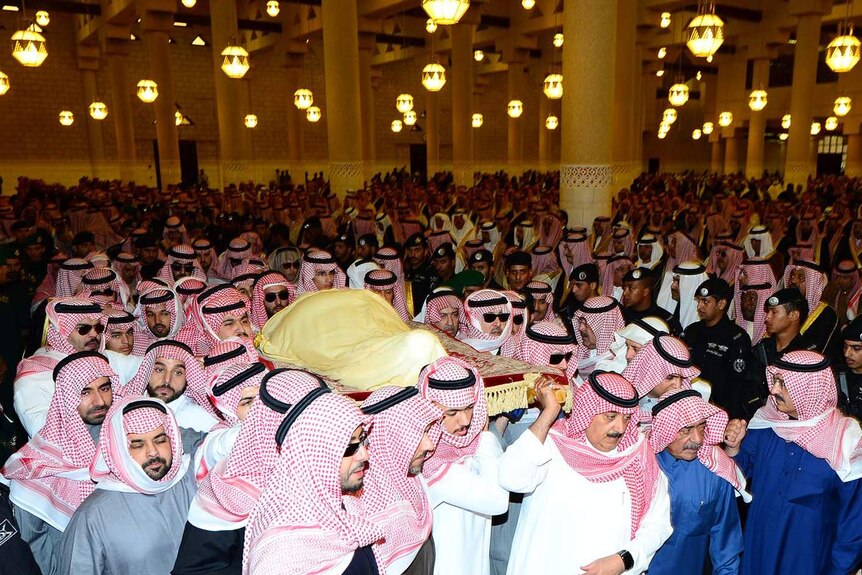 King Abdullah's body is carried during his funeral