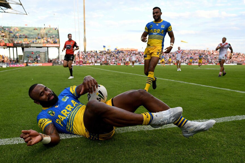 Semi Radradra crosses for an early Eels' try during the victory over the Dragons in Wollongong.