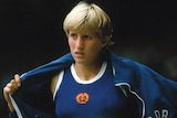 A photo of Ines Geipel as a young woman in her East German sport uniform.
