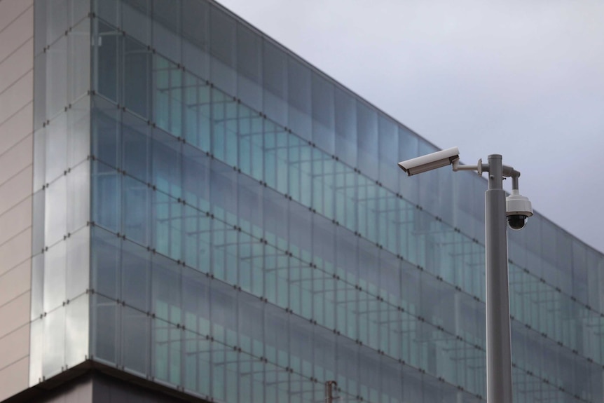 Surveillance cameras outside the new ASIO headquarters in Canberra.