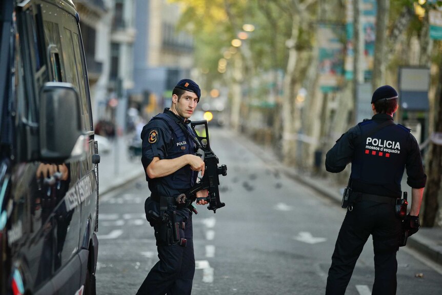 Police patrol deserted Barcelona street after Las Ramblas attack