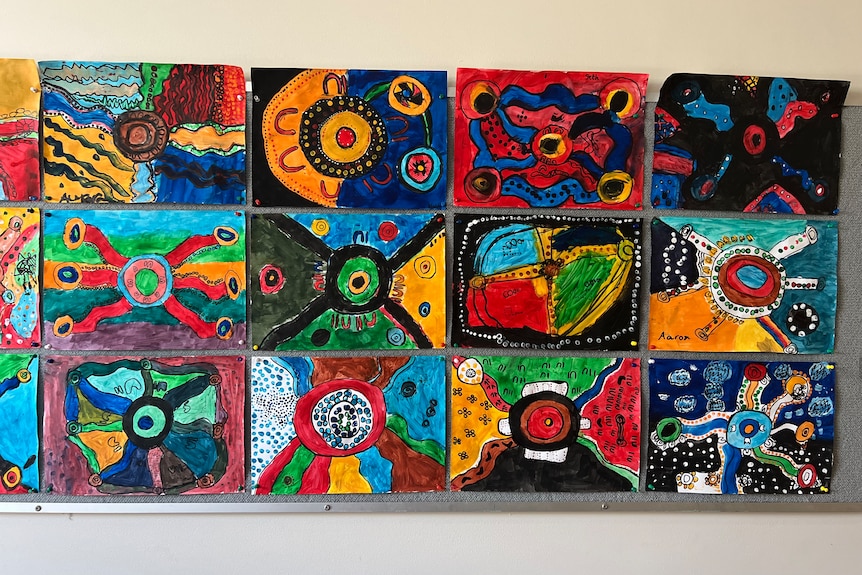 A 4 by 3 grid of indigenous artworks made by primary school children.