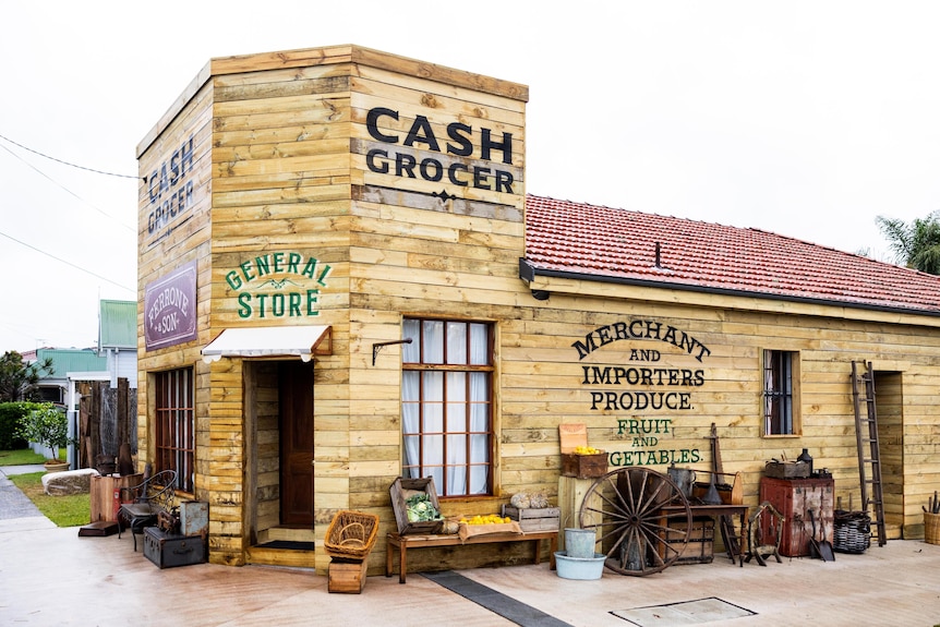 Exterior of a shop made to look like it was a general store from the 1800s.