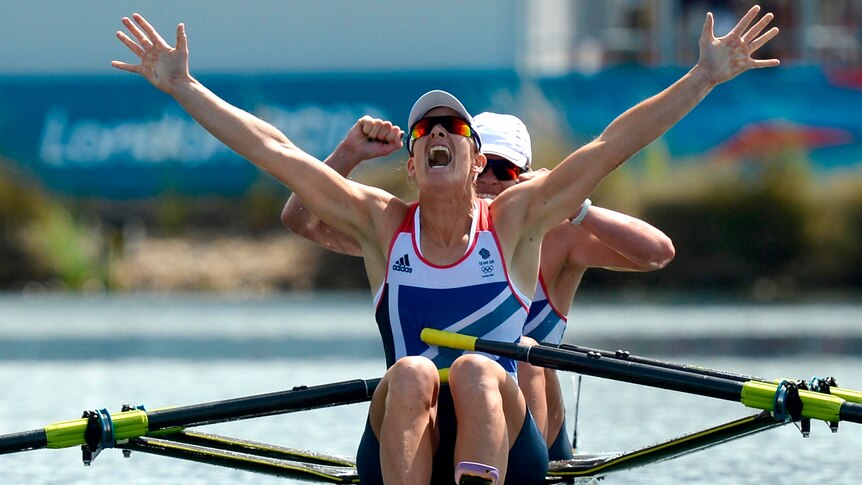 Katherine Grainger (front) and Anna Watkins celebrate winning gold in the women's double sculls.