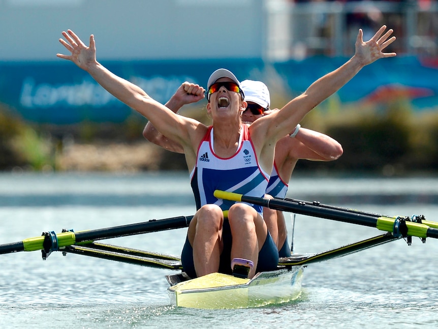 Katherine Grainger (front) and Anna Watkins celebrate winning gold in the women's double sculls.