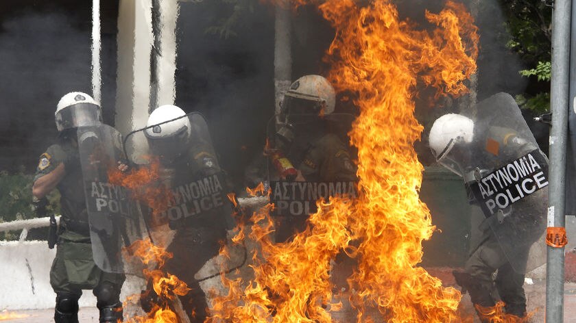 Greek police hit by molotov cocktail