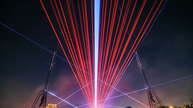 A laser light show over Hobart during Dark Mofo