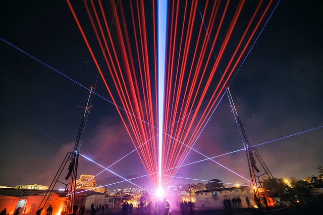 A laser light show over Hobart during Dark Mofo