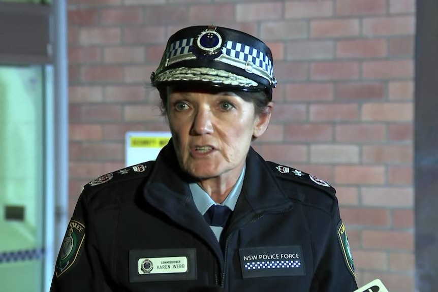 A police officer speaks at a media conference.