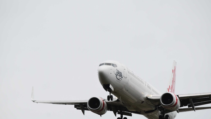 A Virgin Australia plane comes in for landing at Sunshine Coast Airport.