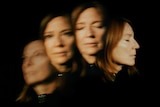 A photo of Portishead singer Beth Gibbons with four versions of her head in profile fanned and blurred