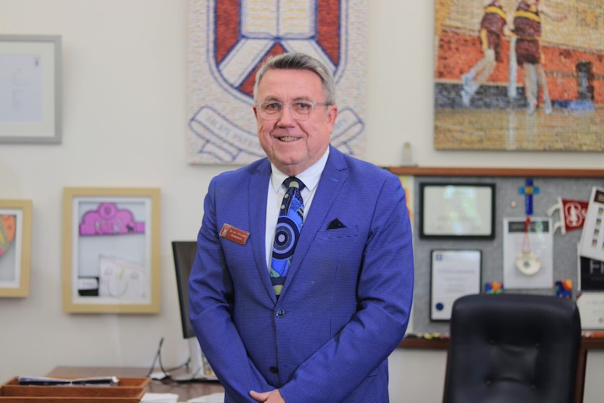 Scotch College headmaster Alec O’Connell stands in his office